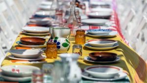 selective focus photography of dinnerware on table